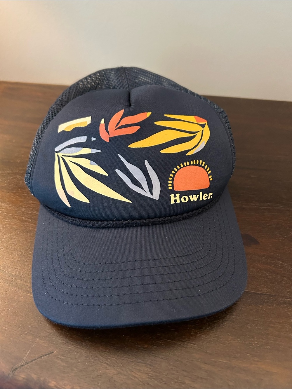 Howler Brothers Navy Foam Trucker Hat with Sunset Leaf Graphic